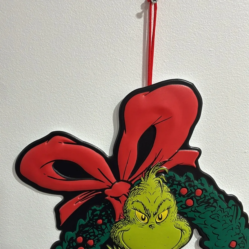NWT- 17-1/4 x13- The Grinch- Metal Holiday Wreath Decoration w/ Large Red Bow